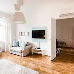 Golden Esthetic With Red Sofa Apartment