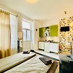 Modern Studio With City Skyline View - Green Skyline