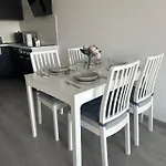 Modern Riverside Apartmen With A Balcony And Garage