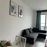 Modern Riverside Apartmen With A Balcony And Garage