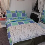 Grey Orchid Apartment - Studio