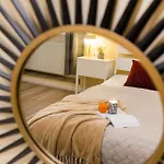 Experience City Nightlife From A Sleek Lavish Pad