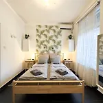 Modern Studio With City Skyline View - Green Skyline