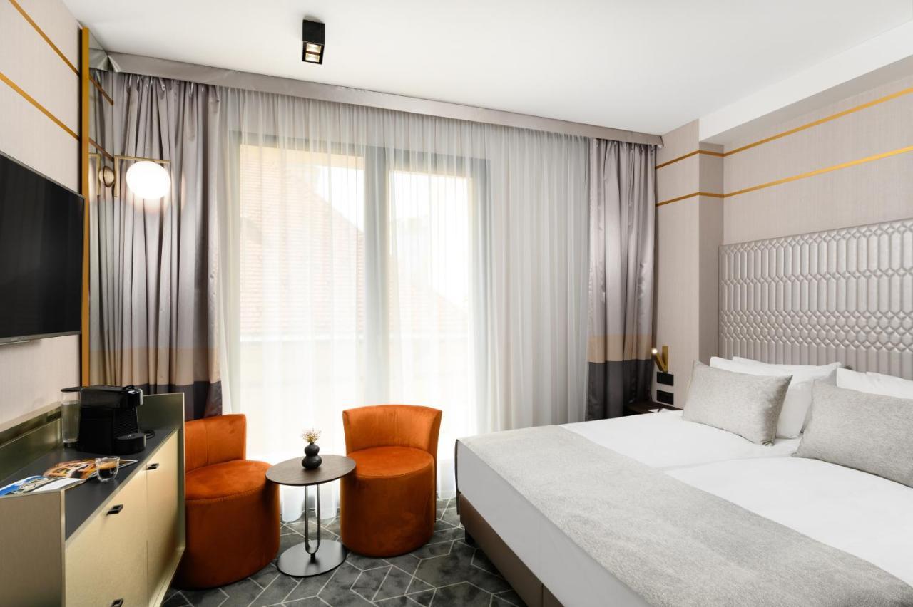 Emerald By Continental Group Hotell