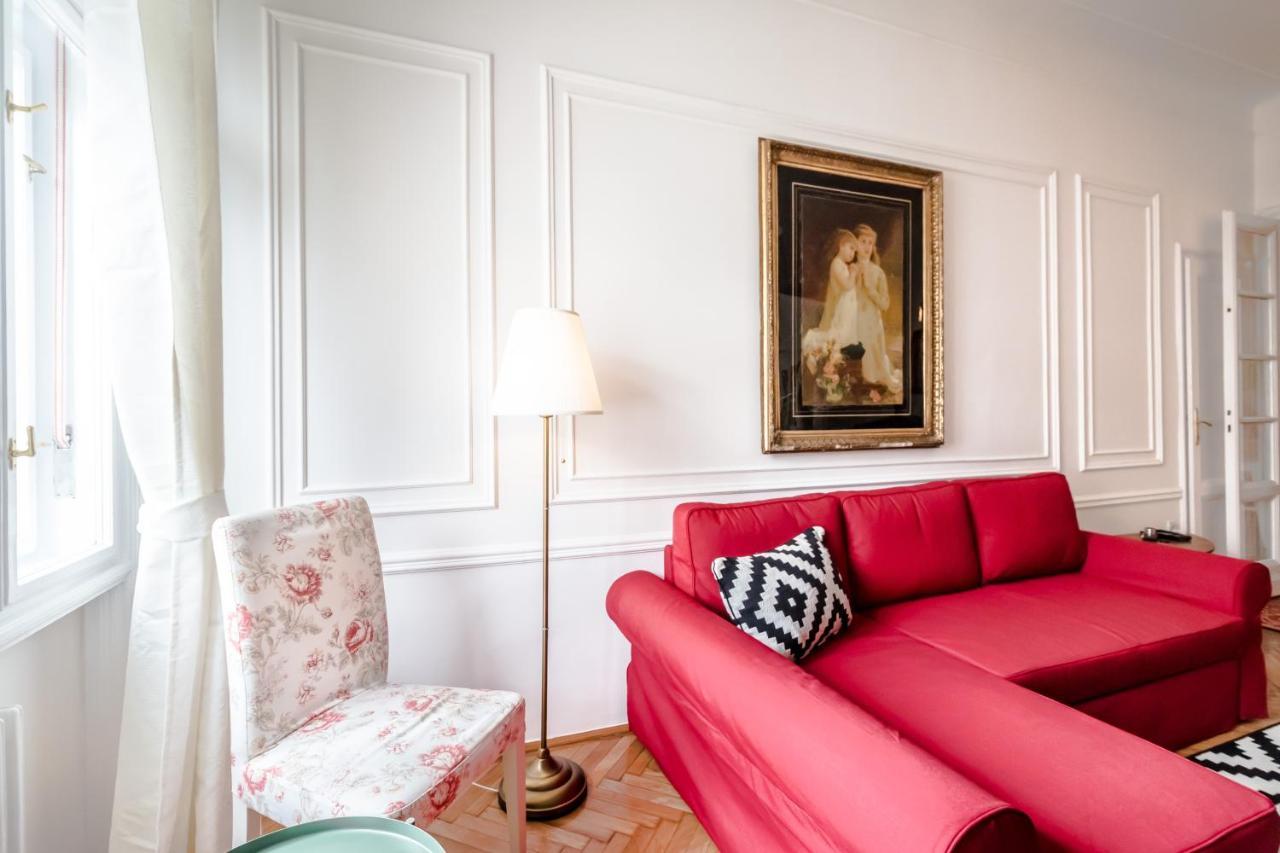 Golden Esthetic With Red Sofa