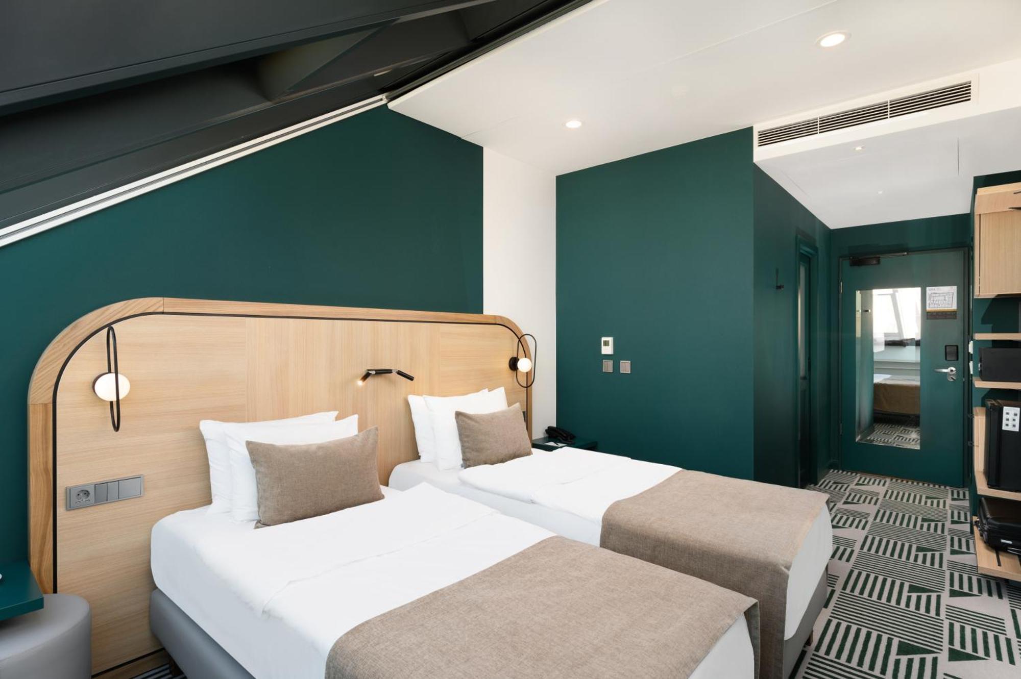 Hotel Oktogon Haggenmacher By Continental Group 4*