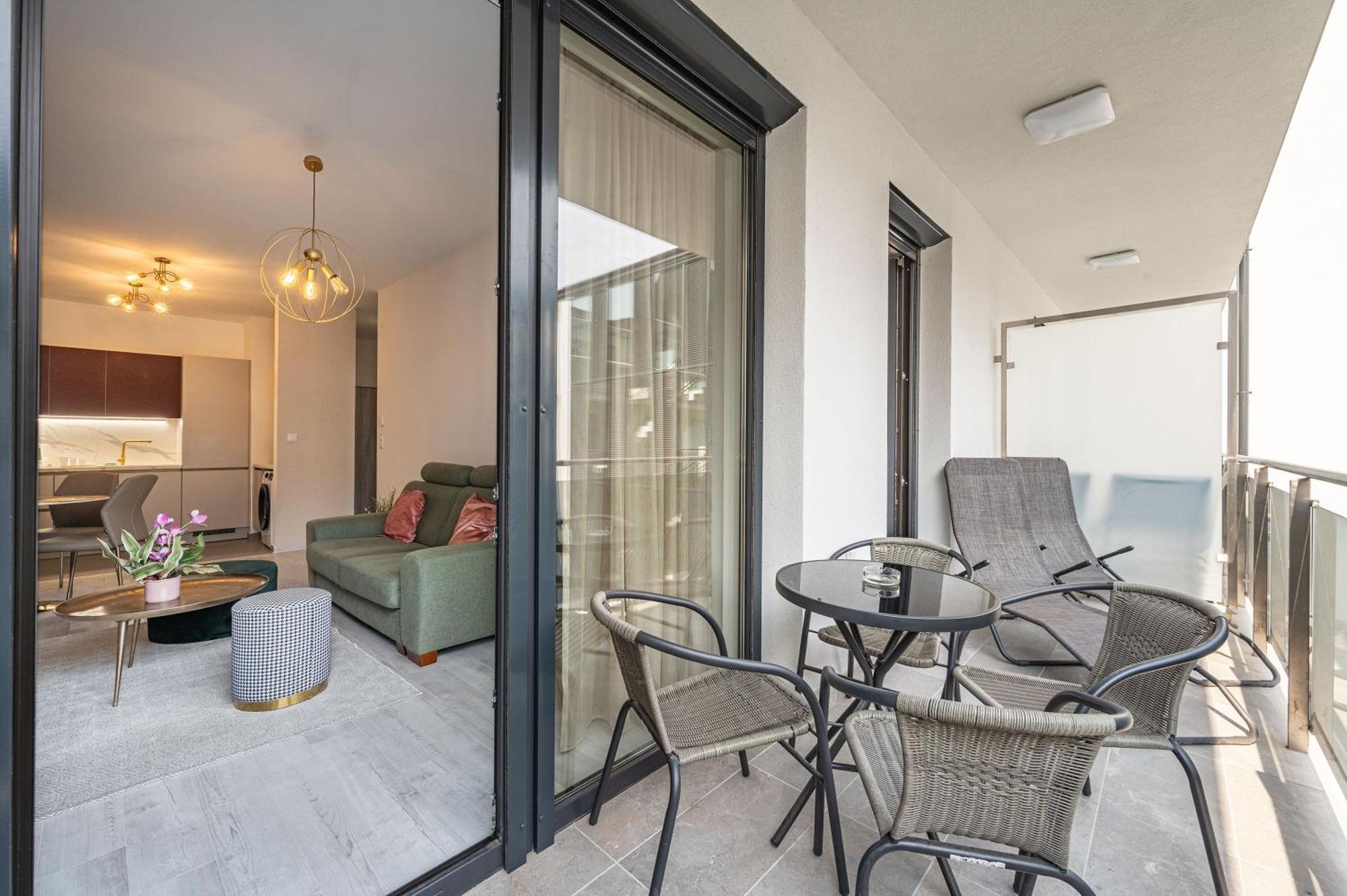 With Garage And Balcony In Center