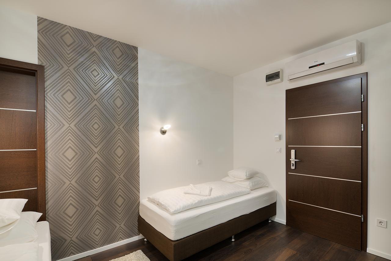 Paulay Downtown Appart hôtel