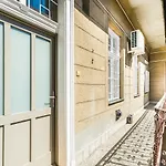 Sun-Splashed Retreat In The Heart Of A Vibrant Quarter