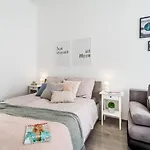 Sun-Splashed Retreat In The Heart Of A Vibrant Quarter